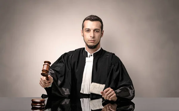 Oldscool young judge in gown — Stock Photo, Image