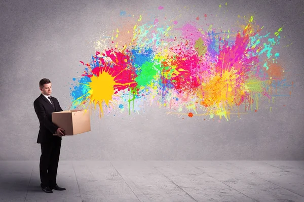 Colour splatter from box — Stock Photo, Image