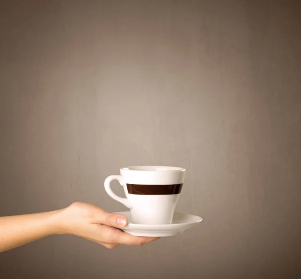 Női kézi üzem kávé-kupa — Stock Fotó