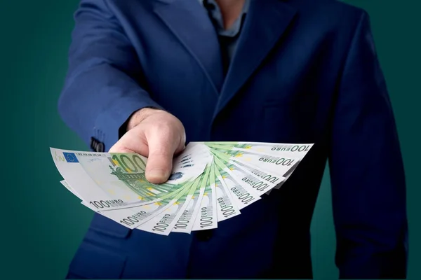 Zakenman bedrijf geld — Stockfoto