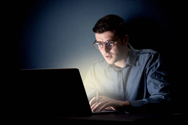 Businessman in the office at night — Stock Photo, Image