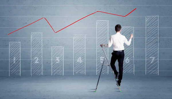 Man drawing chart from ladder — Stock Photo, Image