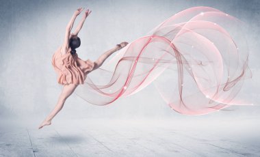 Soyut girdabıyla dans eden bale sanatçısı.