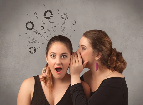 Girl telling secret things to her girlfriend — Stock Photo, Image