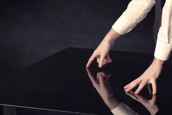 Close up of a hand touching smart table with copy space — Stock Photo, Image