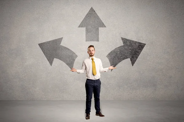 Businessman standing with three arrows — Stock Photo, Image