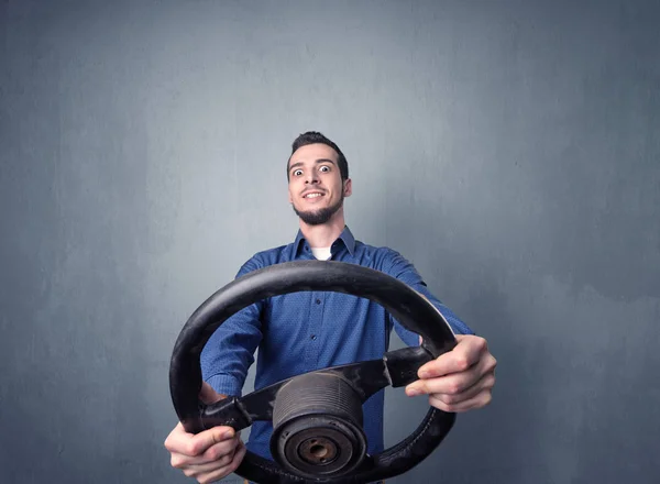 Man holding steering wheel — Stock Photo, Image