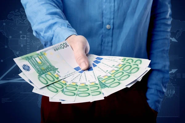 Businessman holding money — Stock Photo, Image