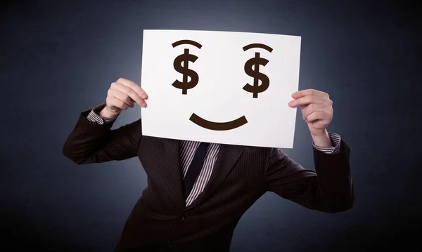 Affärsman som håller papper med giriga känslor — Stockfoto