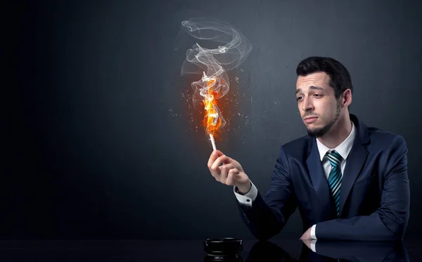 Businessman smoking. — Stock Photo, Image