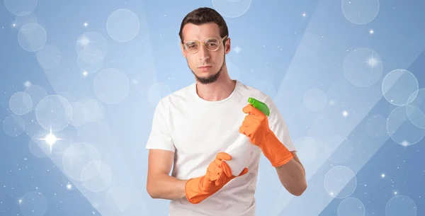 Glittered background with male housekeeper — Stock Photo, Image