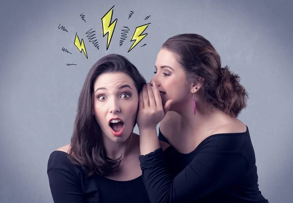 Girl telling secret things to her girlfriend — Stock Photo, Image