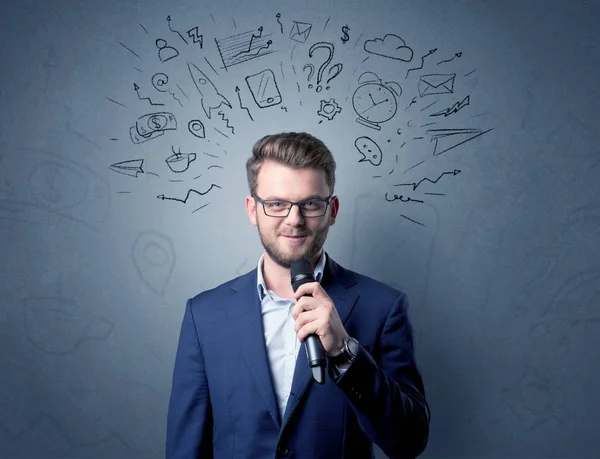 Businessman holding microphone — Stock Photo, Image