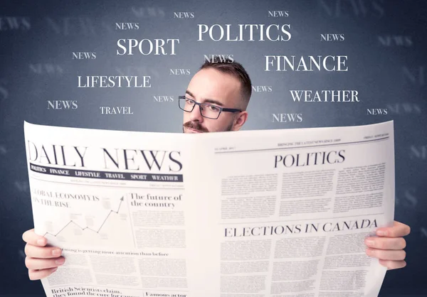 Businessman reading newspaper — Stock Photo, Image