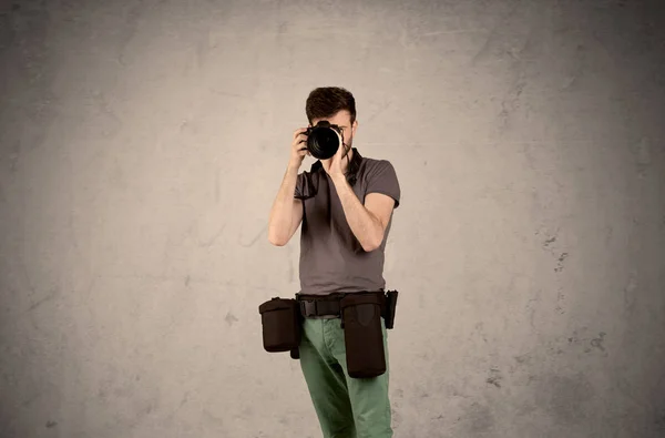 Hobby photographer holding camera — Stock Photo, Image