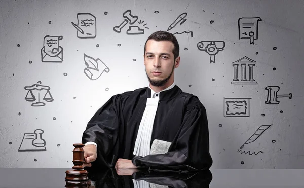 Young judge with court symbols around — Stock Photo, Image