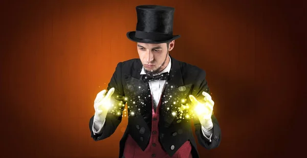 Illusionist holding superpower on his hand — Stock Photo, Image