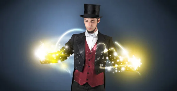 Magician holding his power on his hand — Stock Photo, Image