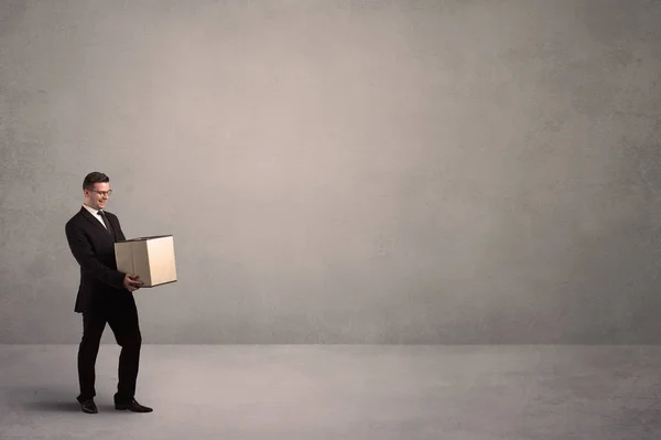 Businessman with empty box — Stock Photo, Image