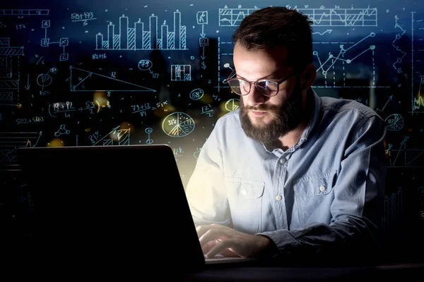 Businessman in the office at night — Stock Photo, Image