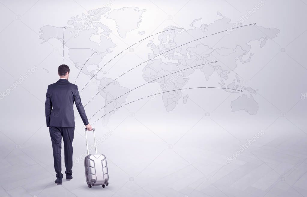 Businessman planning his trip over the world
