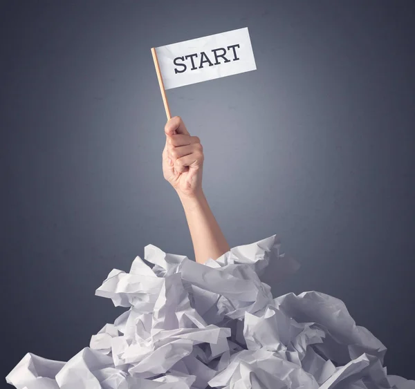 Female hand holding start sign — Stock Photo, Image