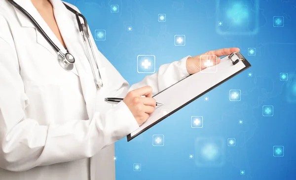 Female doctor with notepad — Stock Photo, Image