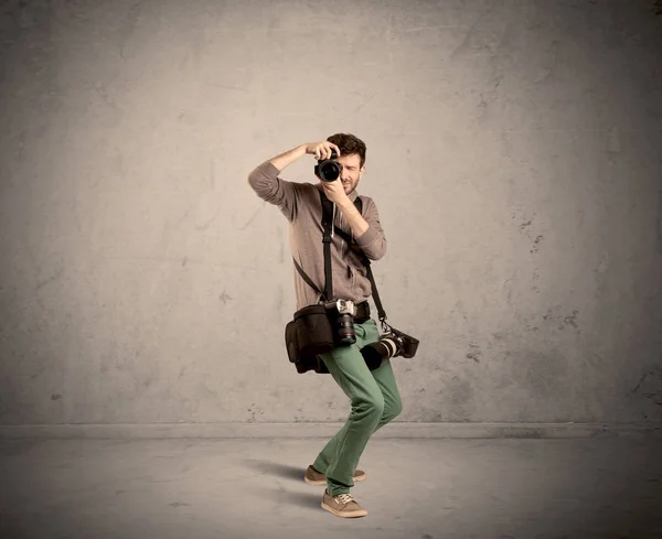 Hobby photographer holding camera — Stock Photo, Image