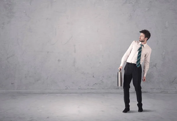 Young businessman standing confused — Stock Photo, Image