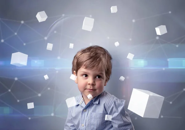 Ragazzo carino con cubi luminosi intorno — Foto Stock