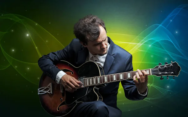 Guitarrista con colorido concepto legendario — Foto de Stock