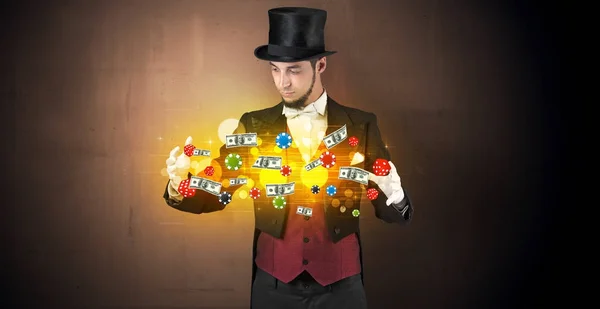 Illusionist conjure with his hand gambling staffs — Stock Photo, Image