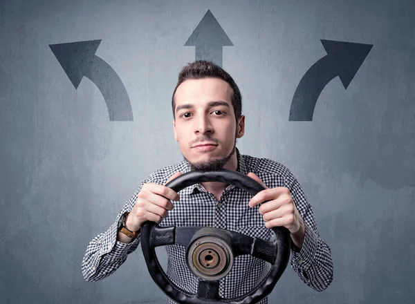 Man holding steering wheel — Stock Photo, Image