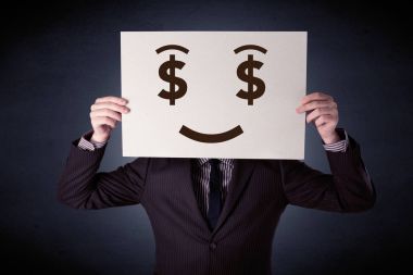 Aç gözlü duygu ile kağıt tutan işadamı 