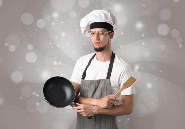 Male cook with shiny grey wallpaper — Stock Photo, Image