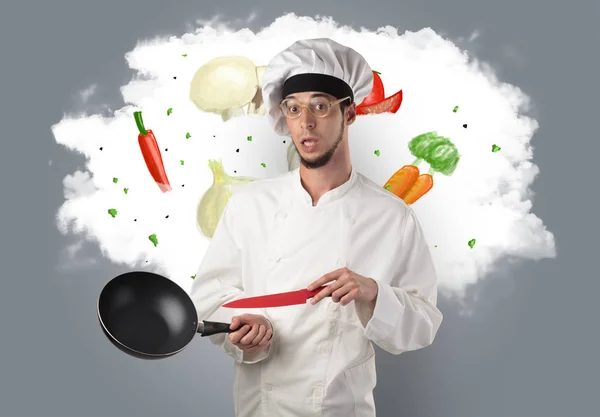 Légumes sur nuage avec cuisinier masculin — Photo