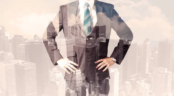Knappe zakenman met overlay stadsgezicht — Stockfoto
