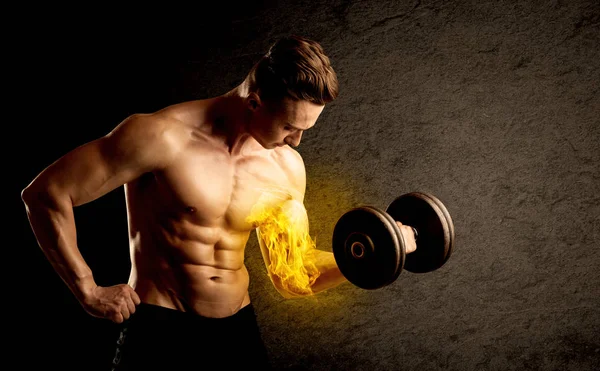 Muscular bodybuilder lifting weight with flaming biceps concept — Stock Photo, Image