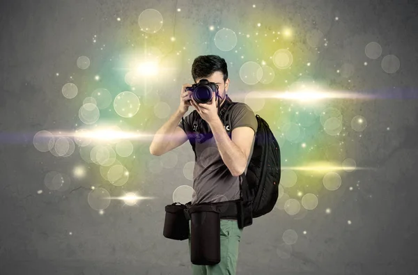 Photographer with flashing lights — Stock Photo, Image