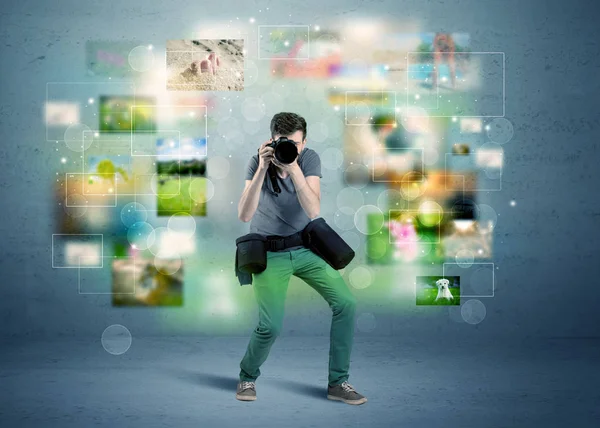 Photographer with pictures from the past — Stock Photo, Image