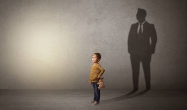Little boy with businessman shadow clipart