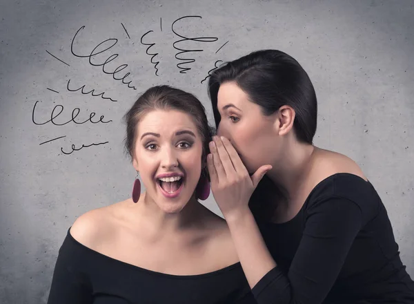 Girl telling secret things to her girlfriend — Stock Photo, Image