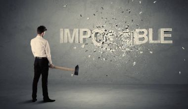 İmkansız işareti çekiçle vurmak iş adamı
