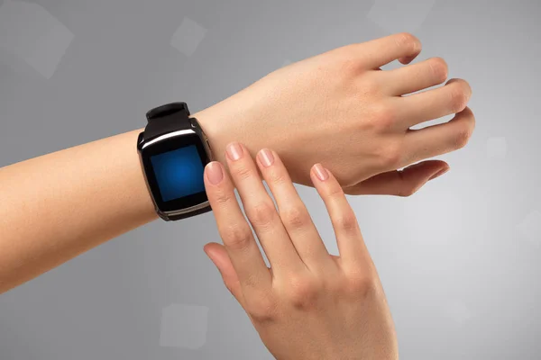 Female hand wearing smartwatch — Stock Photo, Image