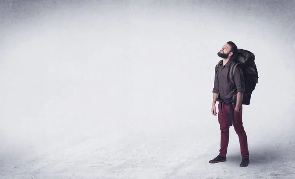 Young man with a backpack — Stock Photo, Image