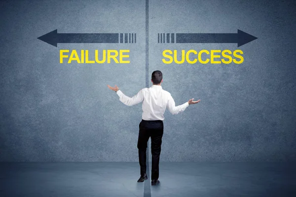 Businessman standing in front of success and failure arrow conce — Stock Photo, Image