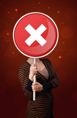 Tutan kadın x işareti