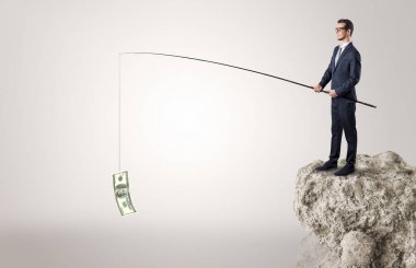 İşadamı Balık tutma Doları bir rock