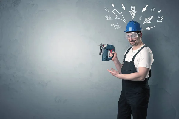 Worker standing with tool. — Stock Photo, Image