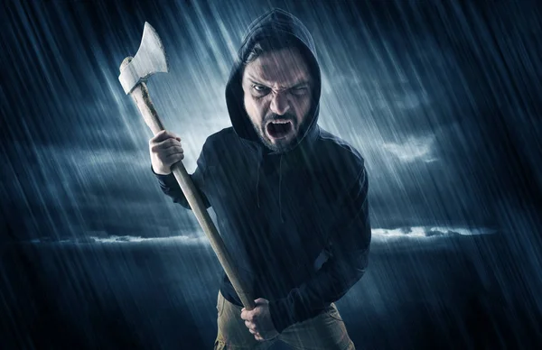 Poacher in mysterious rainy weather concept — Stock Photo, Image